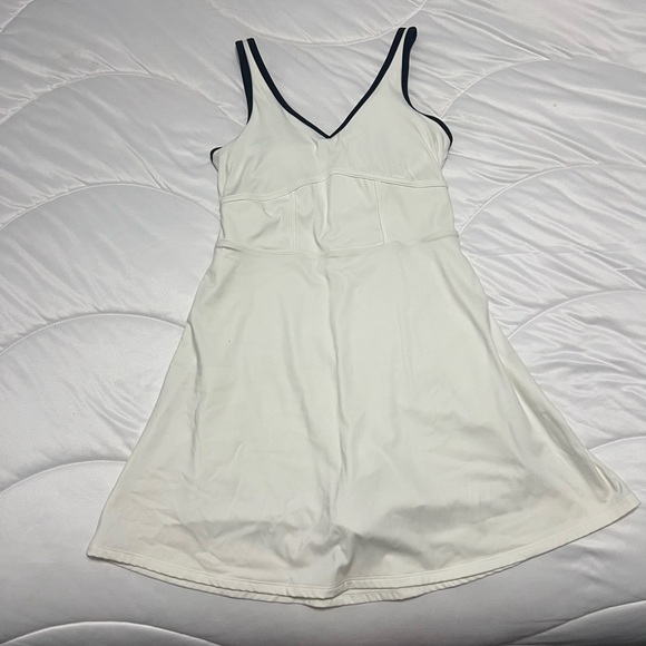 Gilly Hicks Dresses & Skirts - Gilly Hicks Cream Tennis Dress with Black Trim
